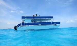 boat-rental-azurea-marina-residences-cancun Boat rental Azurea Marina Residences Cancun yacht cruising in calm lagoon water