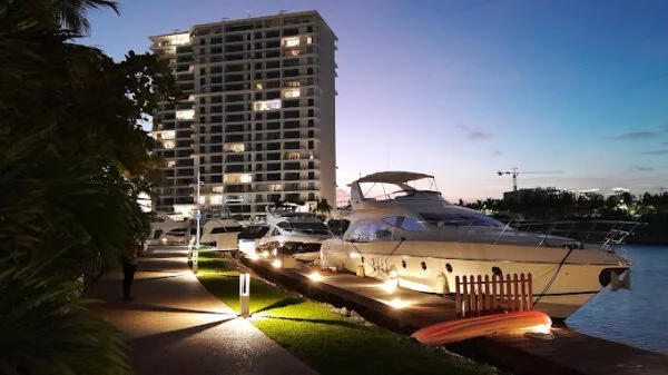 boat-rental-marina-condos-puerto-cancun Boat rental Marina Condos Puerto Cancun yacht cruising in clear lagoon water