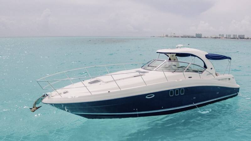 boat-rental-marina-kaybal-cancun Boat rental Marina Kaybal Cancun yacht cruising through mangrove lagoon